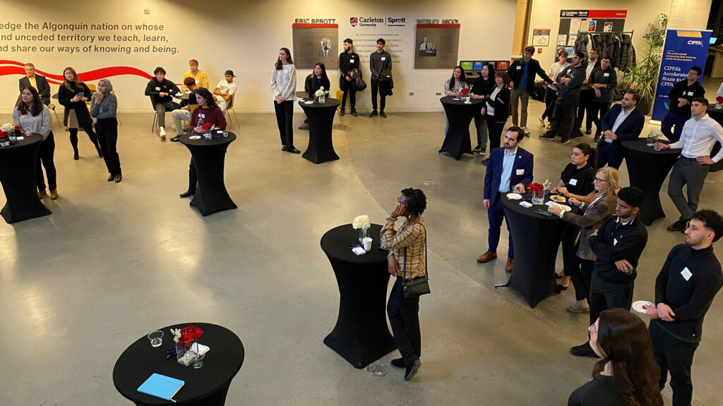 Sprott School of Business students and industry partners at the announcement of a new partnership between CIPFA and the Sprott School of Business at Carleton University in Ottawa, Ontario, Canada.