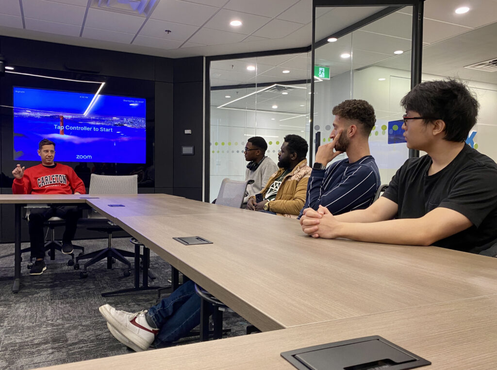 Students from Carleton University's Innovation Hub meet with Knak co-founder and CEO Pierce Ujjainwalla in Ottawa, Canada.