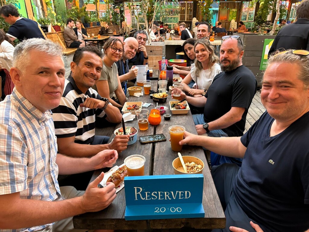 Group of PhD students enjoying a meal