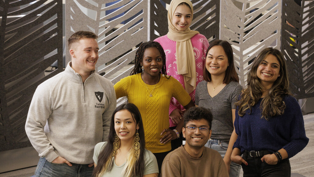 A group of Carleton University students in the library.