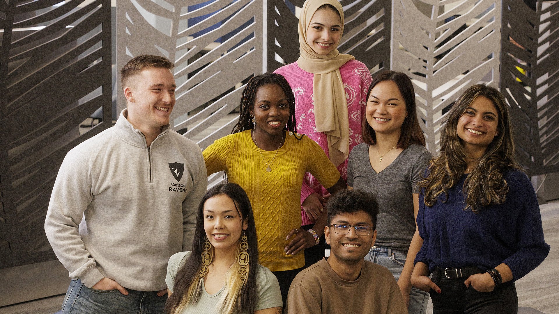 A group of Carleton University students in the library.