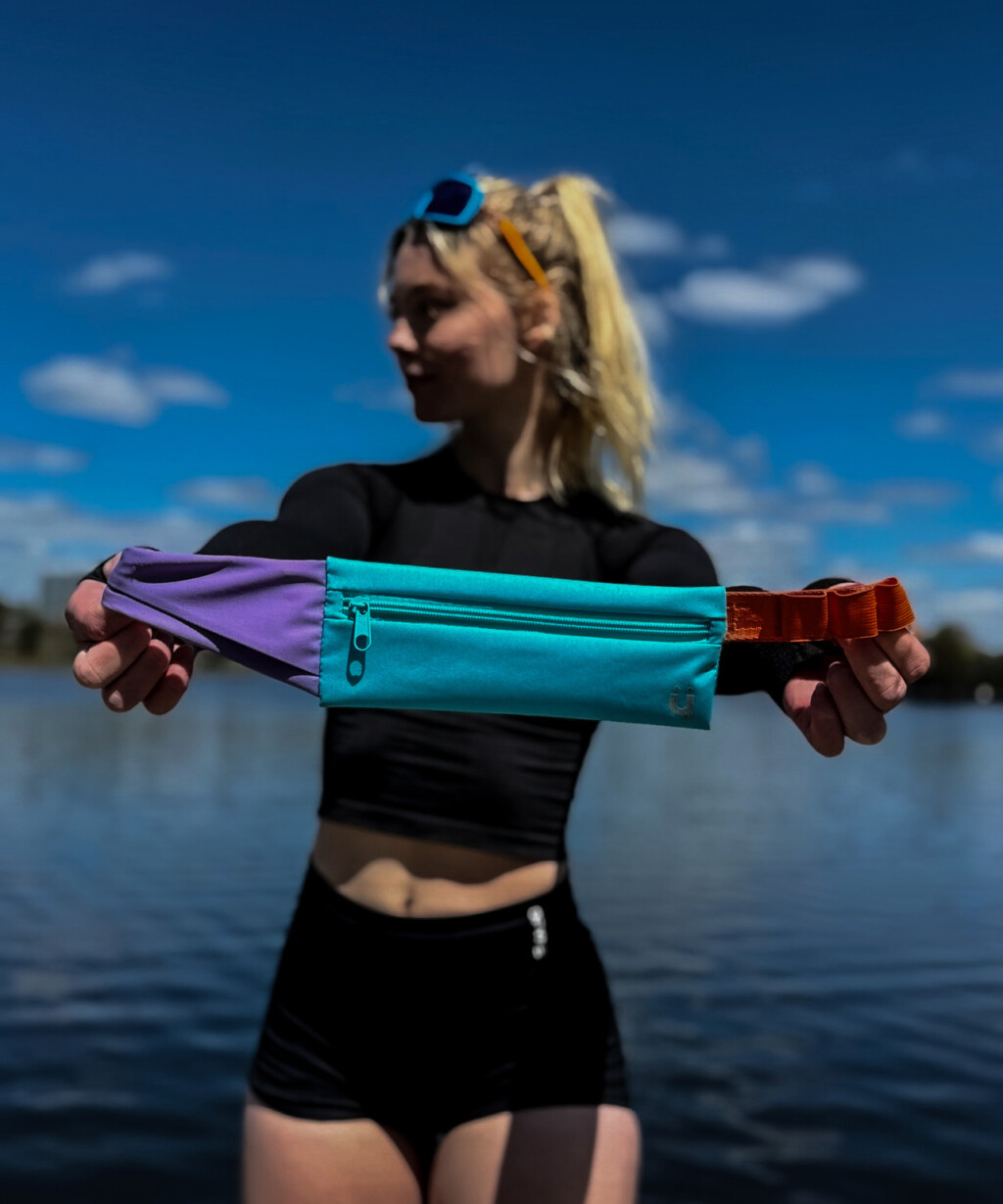Bachelor of Commerce grad Sydney Neilsen with her KRuZ Running belt.