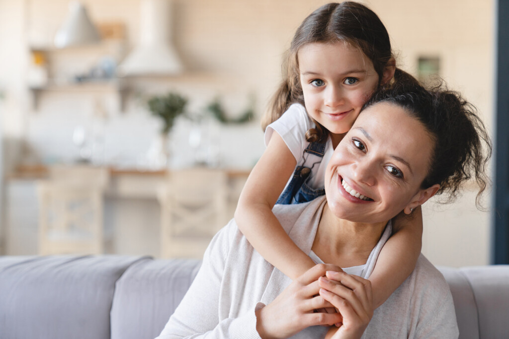 A mother and her young daughter.