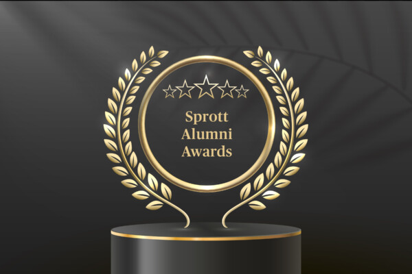 Golden trophy that says Sprott Alumni Awards set against a black background.