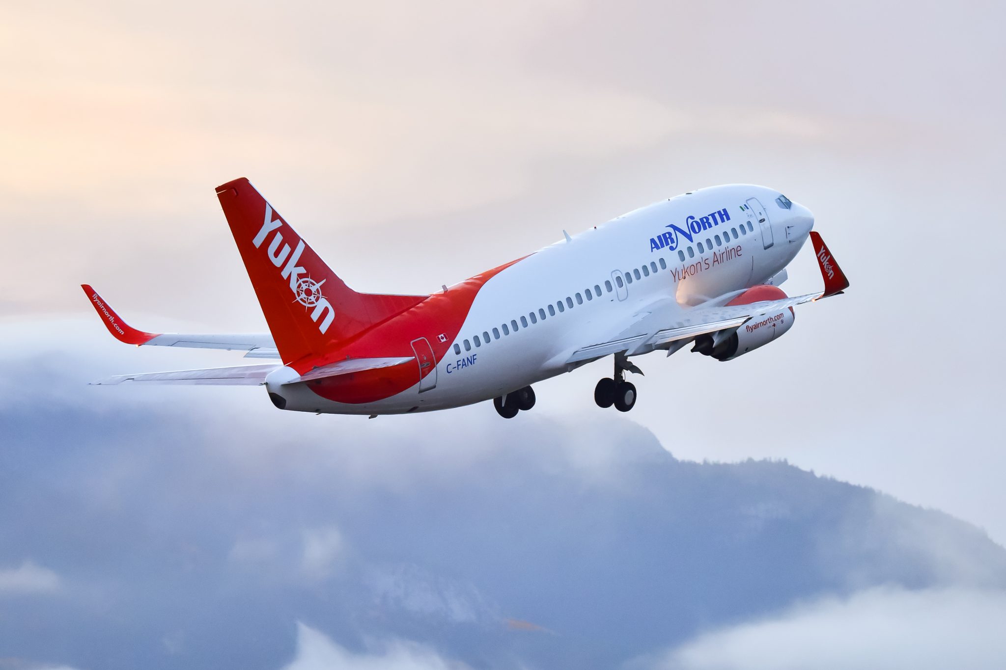 An Air North Yukon airplane taking off