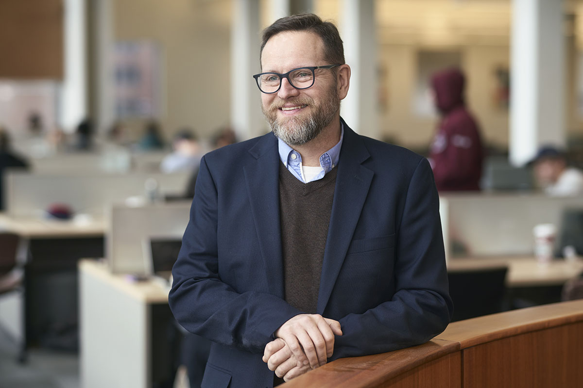 Andrew Webb in MacOdrum Library looking to the side