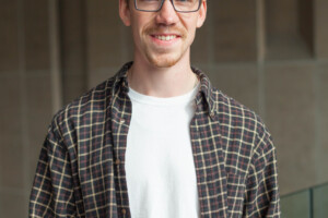 Blake in a plaid shirt in the Richcraft Atrium