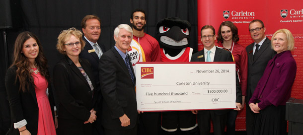 Group shot of CIBC presenting cheque  of $500,000 to Carleton University for a new bursary program for Sprott School of Business students.