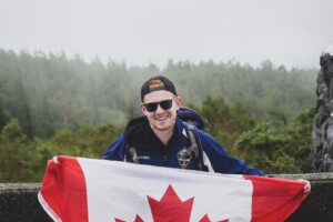 Braydon holding up a Canada flag