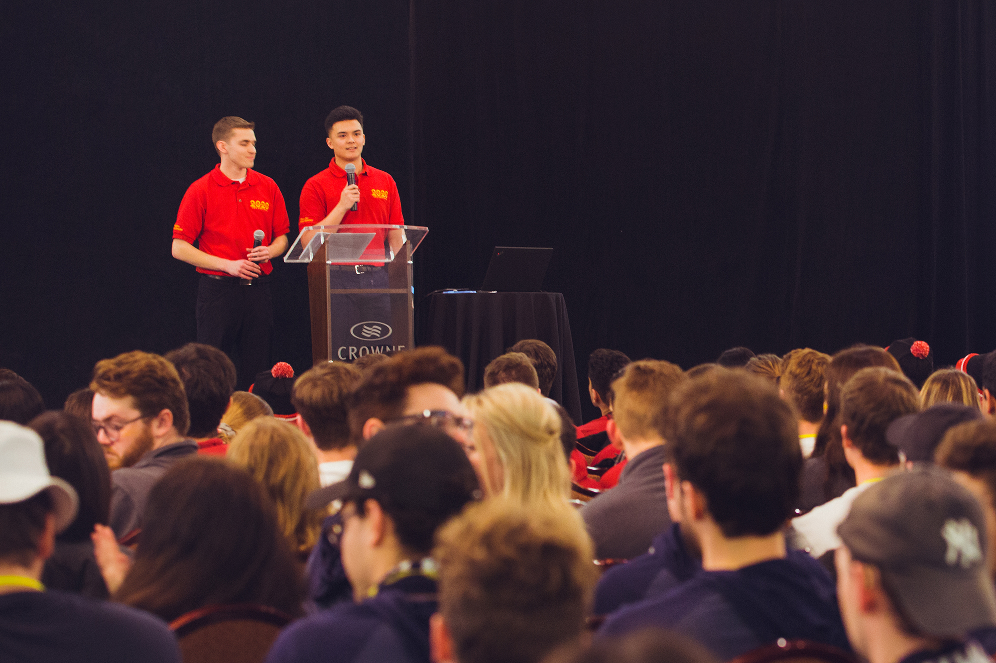 Harry and Ty speaking to a room of JDCC delegates