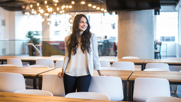 BCom alum Konval Matin in Shopify's cafeteria.