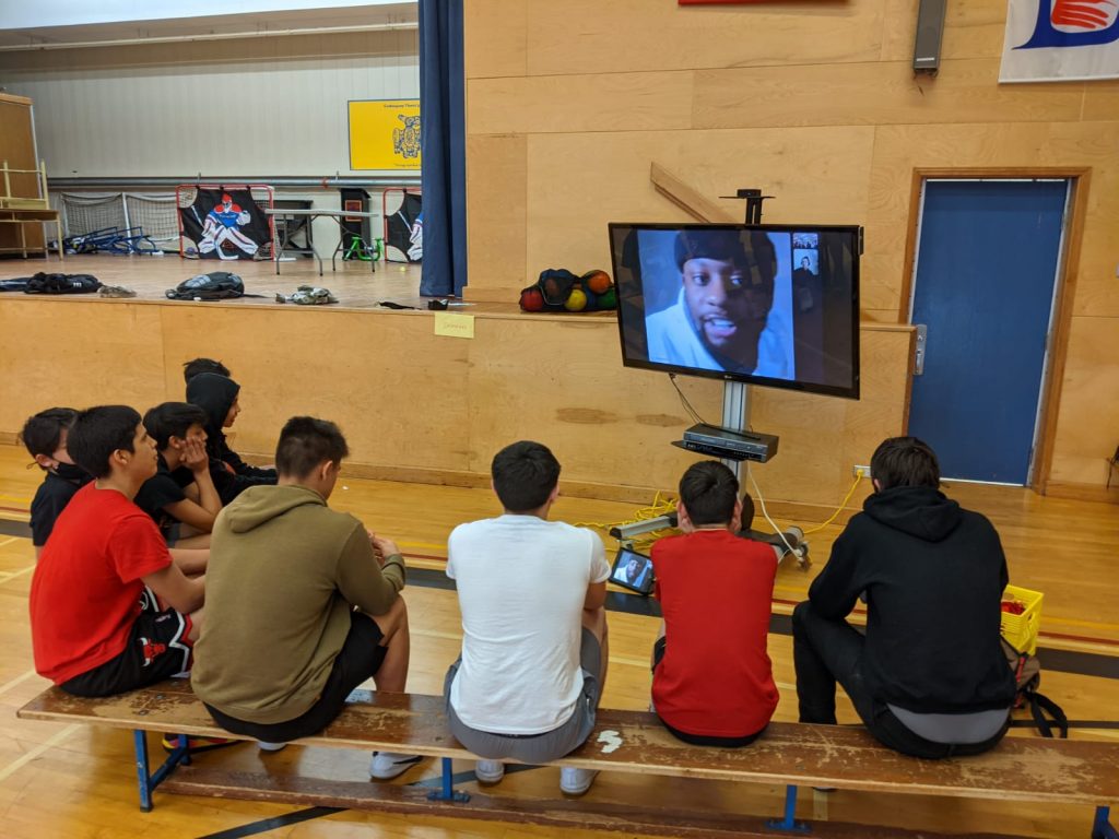 Students in Masset, British Columbia video chatting with Northern Lights students.