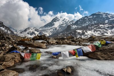 Coloured flags on the summit of a mountain in Nepal