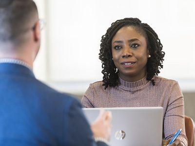 PMBA student Mujidat Durodola in discussion with a fellow PMBA student