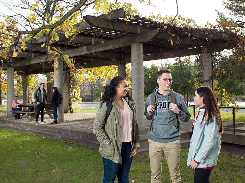 Sprott students outside on campus at Carleton University.