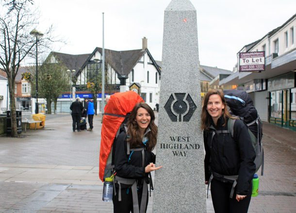 Photo of Pia and Rachel at the statue that marks the beginning of the West Highland Way 
