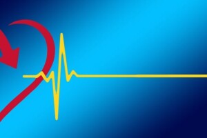 Red outline of heart with yellow lifeline on blue background