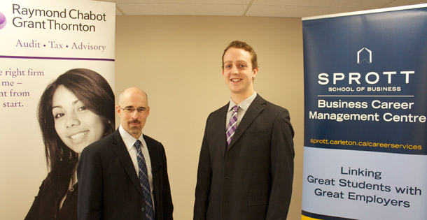 photo of accounting student Joel Crawford and RCGT partner Shawn Mincoff