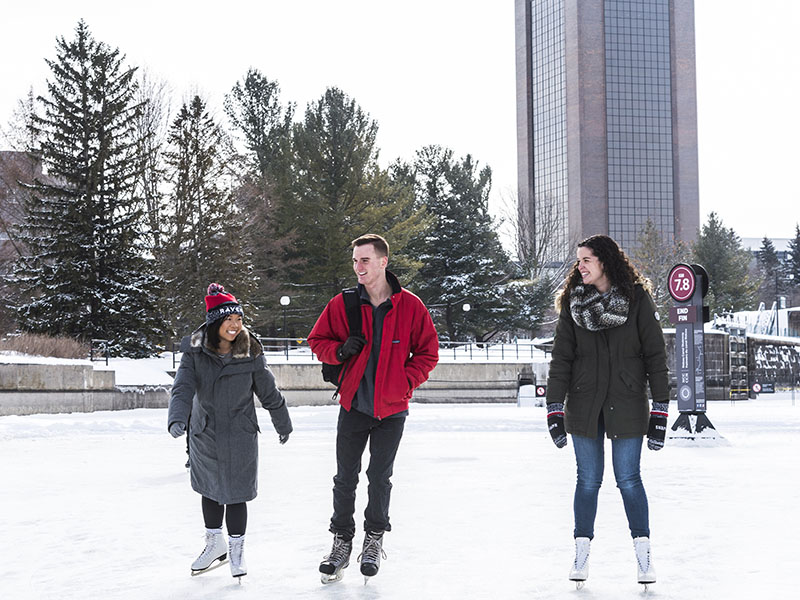 Carleton students ice skating on the Rideau Canal.